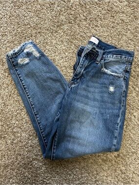 Distressed Mid-Wash Blue Denim Jeans